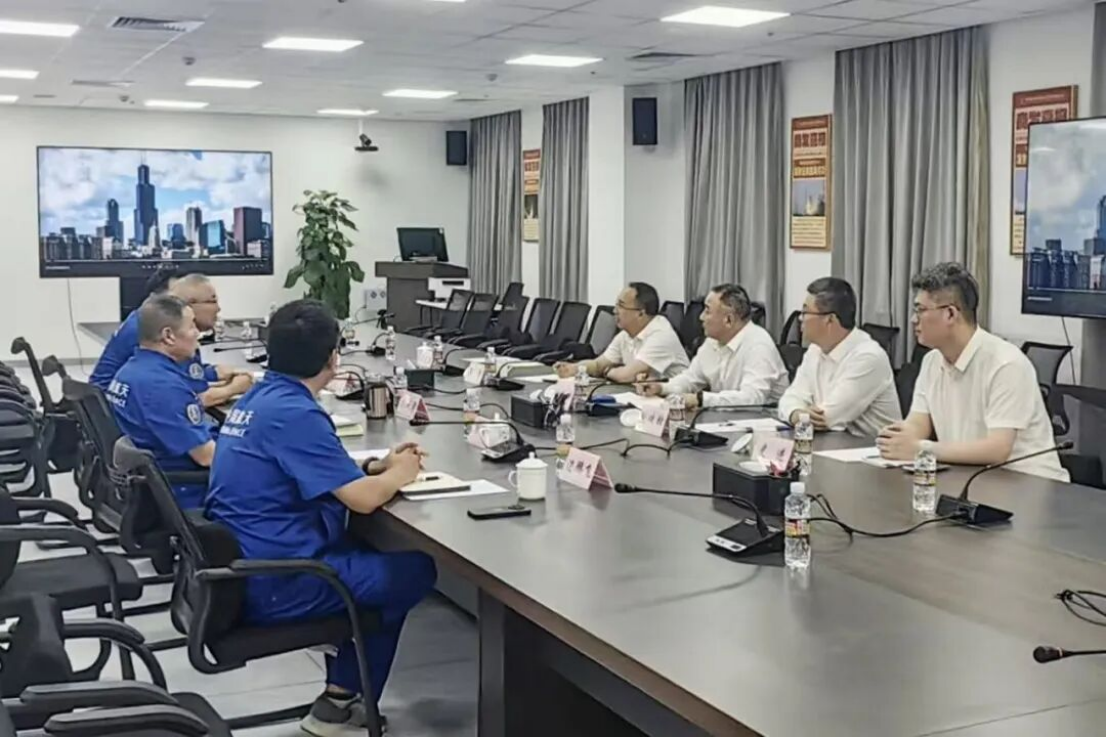 付建中与海南国际商业航天发射公司党委书记、董事长杨天梁座谈交流